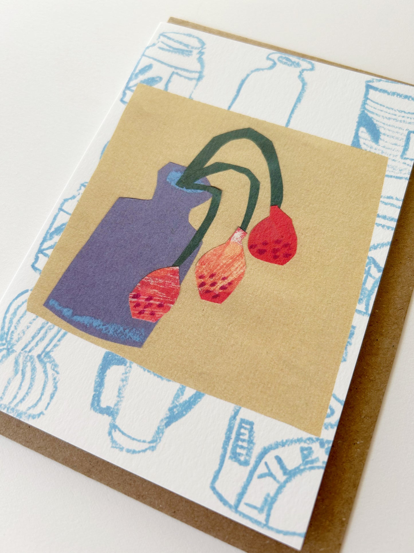 Red Flowers in Blue Vase Card