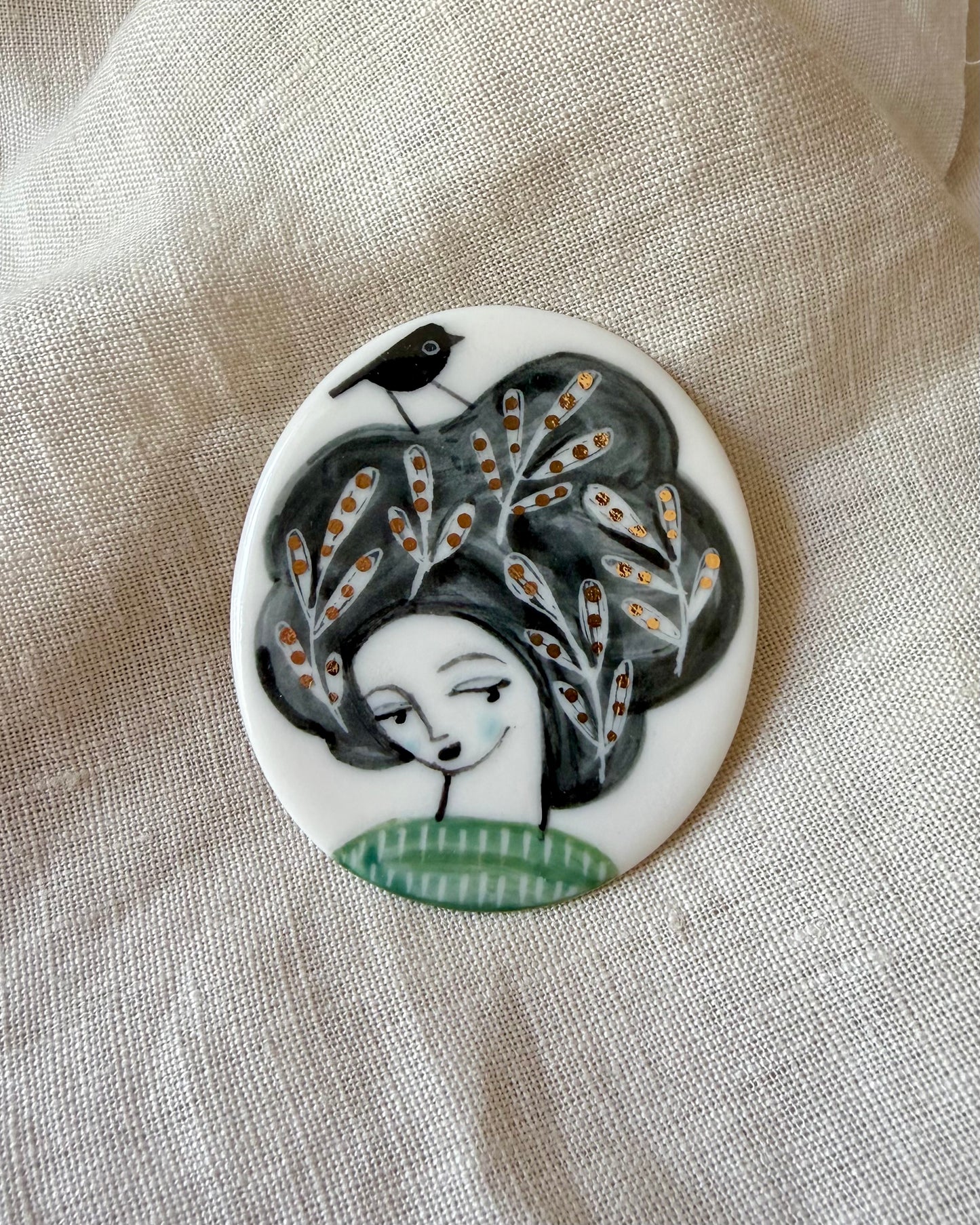 Bird on Hair Porcelain Brooch