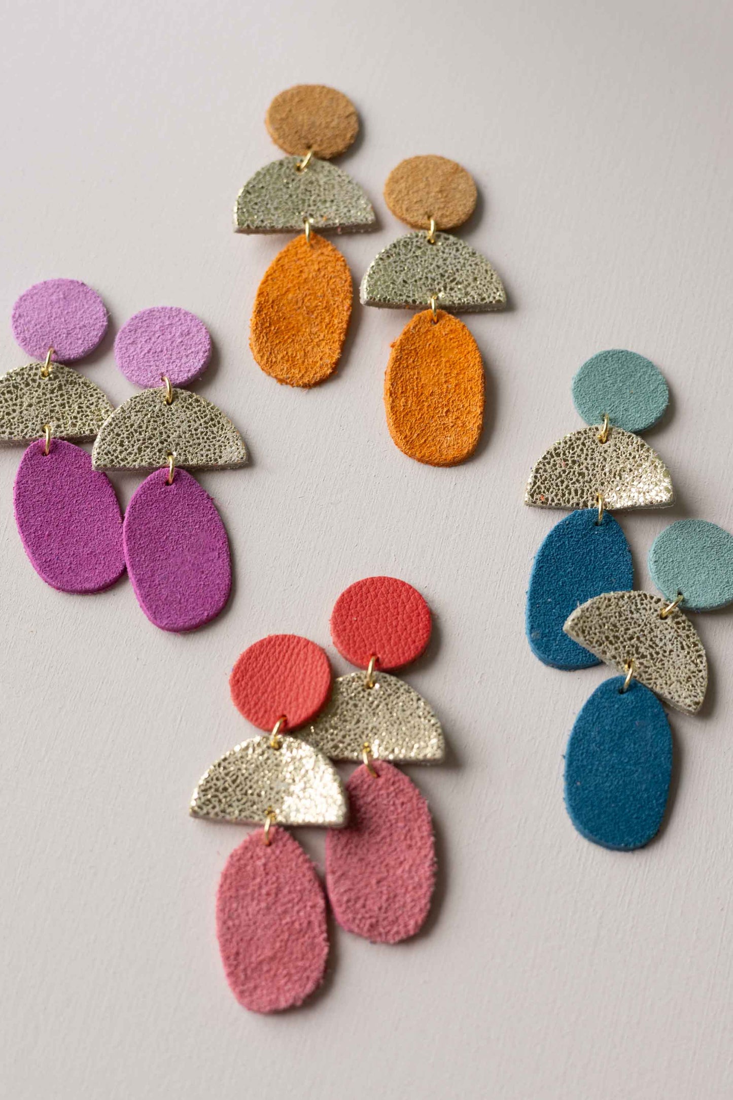 Bamaluz Dangle Leather Stud Earrings