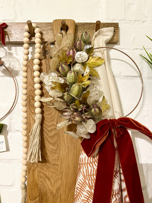 Dried flower and brass leaf wreath