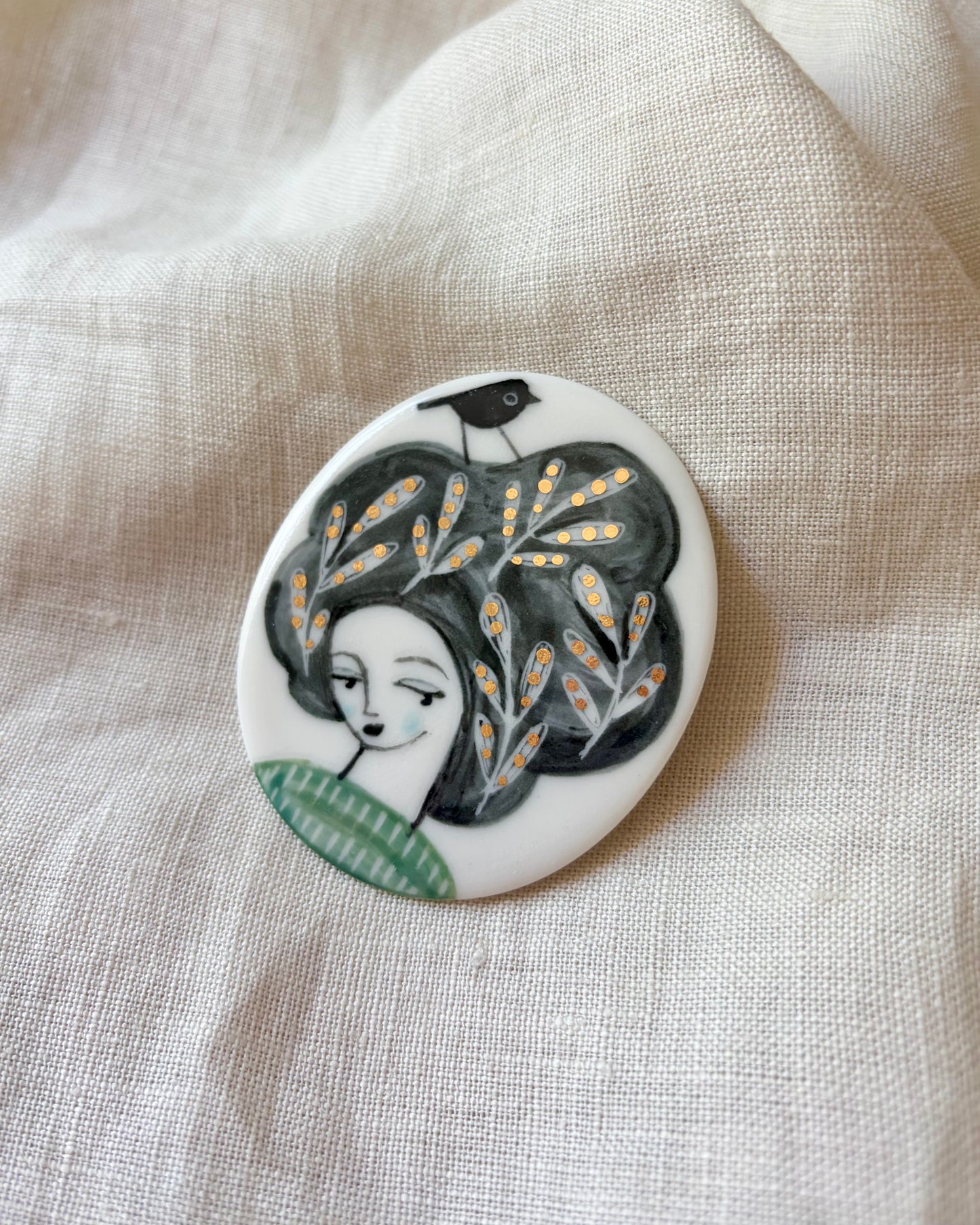 Bird on Hair Porcelain Brooch