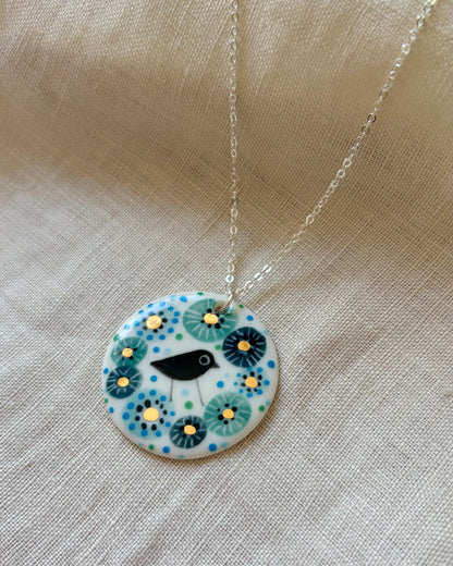 Bird in Blue Flower Necklace With Gold Lustre
