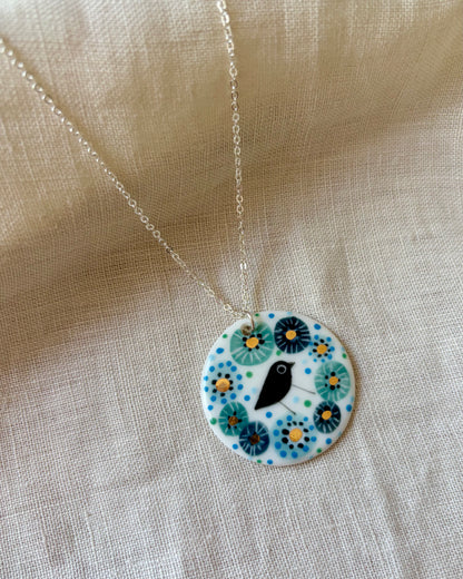 Bird in Blue Flower Necklace With Gold Lustre